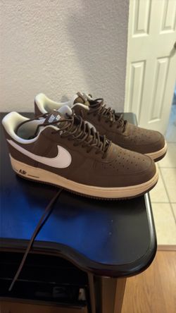 Brown and white Nike Air Force size 10   75.00