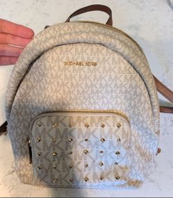 Michael Kors Mini Backpack Purse Vanilla MK Logo Studded Front Pocket Brown Trim