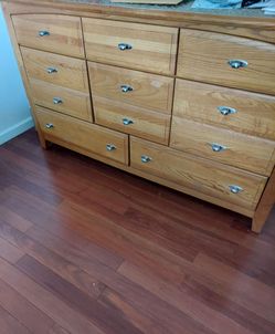 Solid wood oak 8-drawer dresser.
Dimension: 64 x 37X 18 inches.
