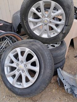 Oem 115mm 5.lug wheels Chevy.