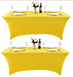 Two 6ft yellow stretch table covers