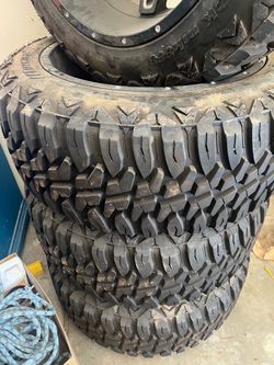 35” mud tires and rims