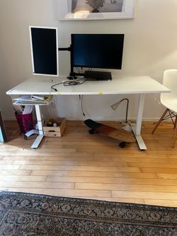 White desk with monitors