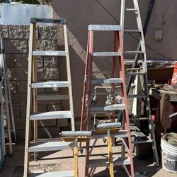 2 - 6 ft ladders 1- 10 tree ladder and 2 roller stands $30 for all
