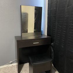 black vanity desk with mirror