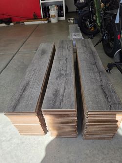 250ft² of Beautiful Gray Laminate Floors