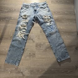 Levi’s 511 Light Wash Distressed Slim Jeans