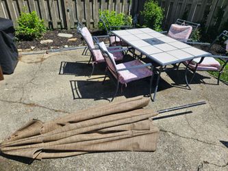 Patio table, chairs and umbrella