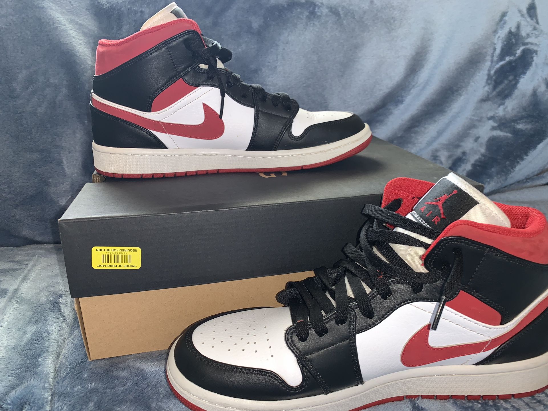  Air Jordan 1’s Mid white black and red.