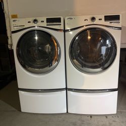 Whirlpool front load Washer and Dryer set.