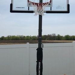 Goaliath 54 inch in ground basketball hoop, adjustable basketball court 