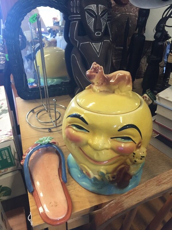 Vintage Roseville cow jumped over the moon cookie jar