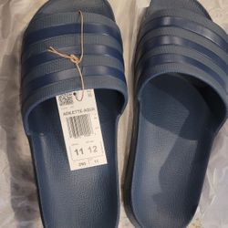 Adidas Slides size 11 Men's Or Women's Size 12