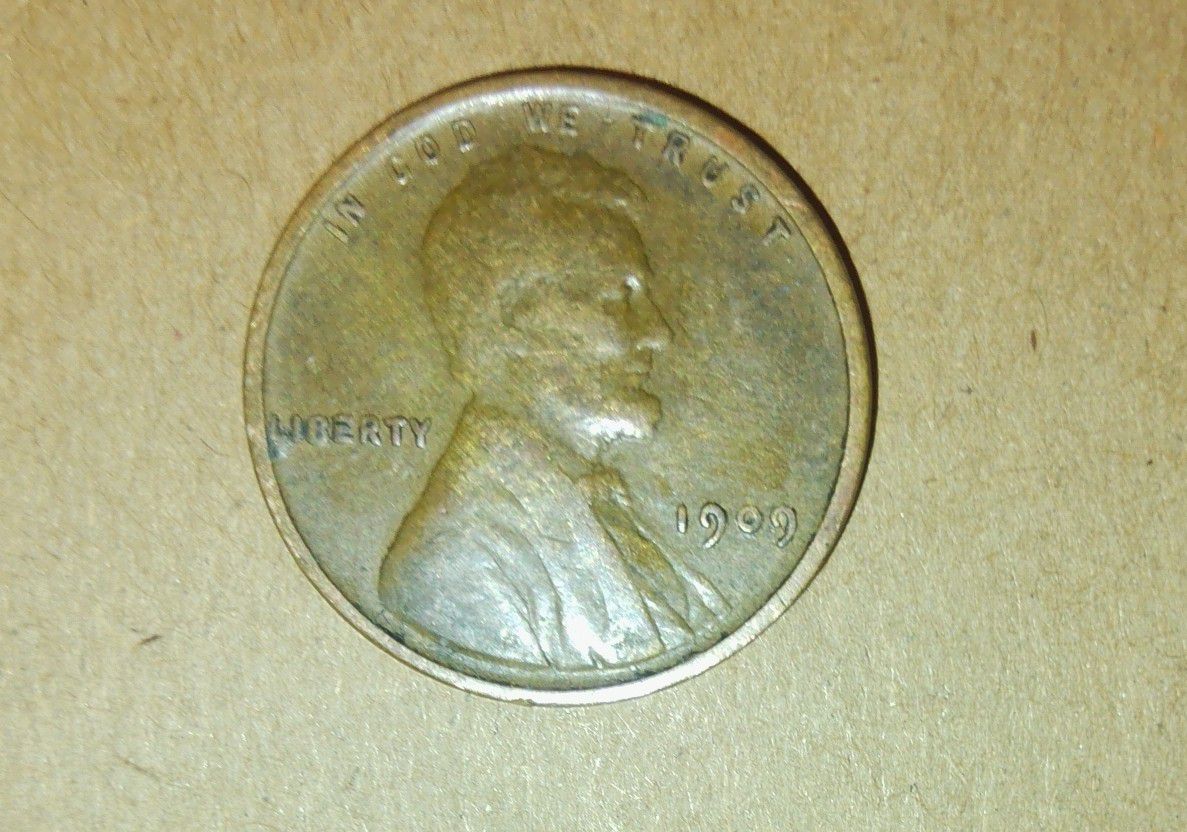 1909 Lincoln Wheat Penny No Mint Mark And Letters VDB On Reverse 