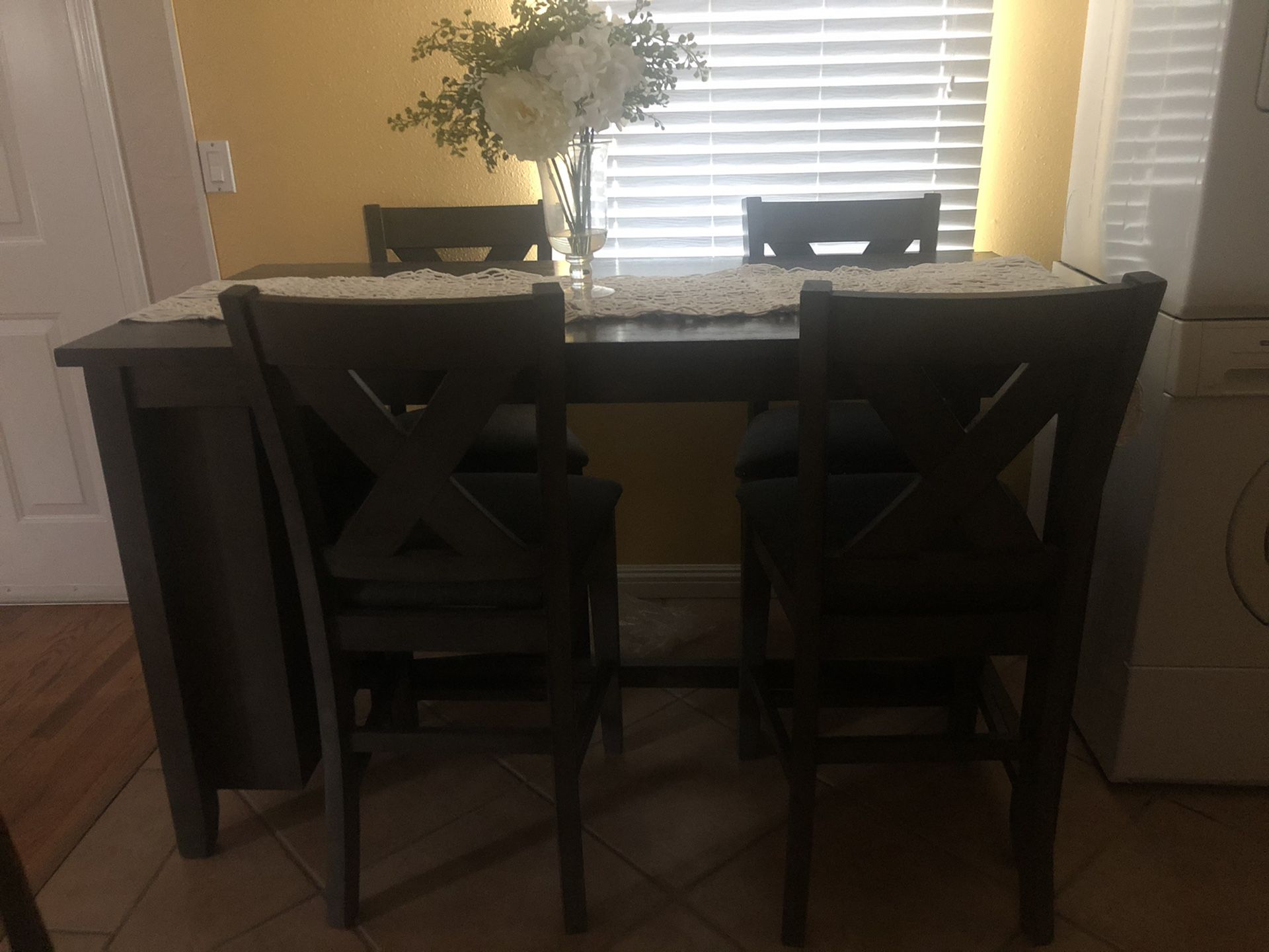 Like new Ashley furniture table and chairs