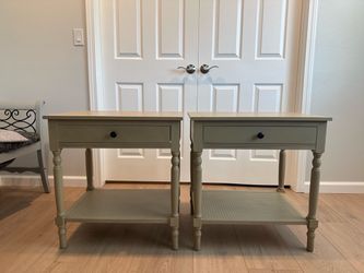 Two wooden side tables
