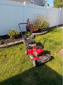 Self propelled lawn mower