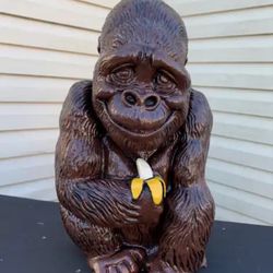 Monkey Holding Banana Statue
