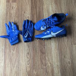 Blue football cleats with blue football gloves