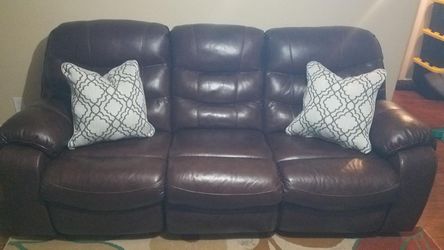 Leather Sofa on the ends recliners chocolate brown