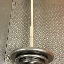 48 inches Steel Standard Barbell W/Weight Plates: 25s, 10s and 5s ponders. 93 # Brute W.