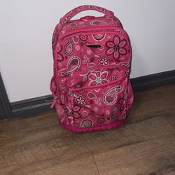 pink rolling backpack