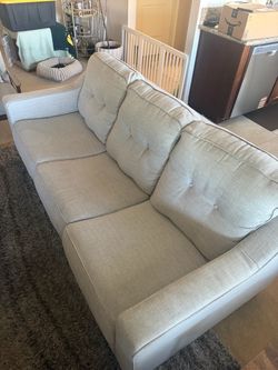 Living Spaces Couch and Loveseat Set