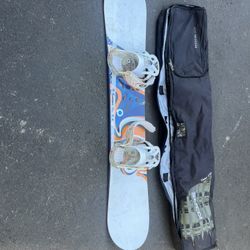 Snowboard Comes With Boots And A Board That Also Comes With A Bag