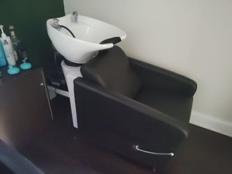 Salon shampoo chair and bowl.