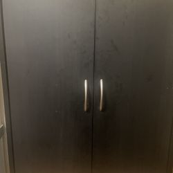 2-Door Dark Storage Cabinet w Wood Trim