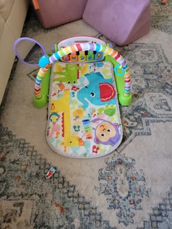 Baby Lay Down Piano Toy Used