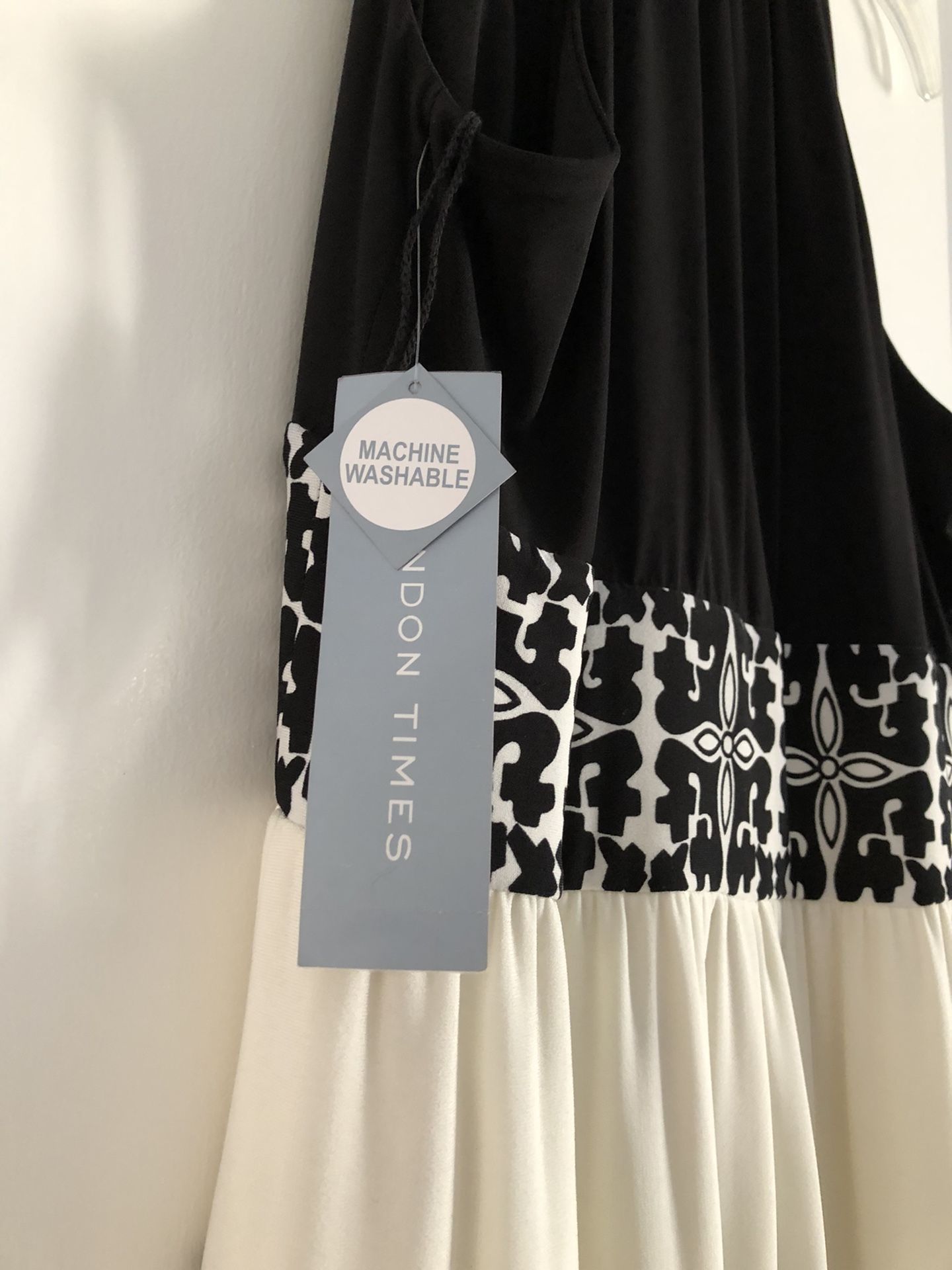 Beautiful black and white dress .