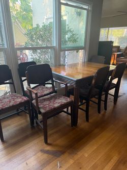 Antique table with 6 chairs