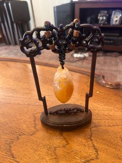 I got agate; Vintage Carved Chinese Agate Pendant on Ornate Carved Stand:
