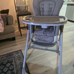 9-in-1 Convertible High Chair – Great Condition!