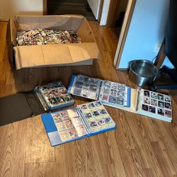 Big box of baseball basketball and football cards, and four books full of baseball basketball and football cards