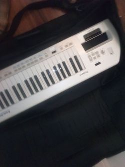 Ax 09 Roland Keyboard synthesizer with case