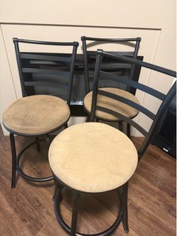 3 swivel chairs