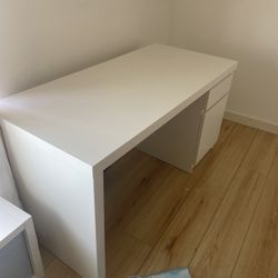 white ikea desk with cabinet