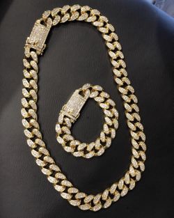 New 18 k yellow gold Cuban link chain and bracelet