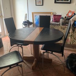 Oak Ovel Table 49” X29” 4 Chairs