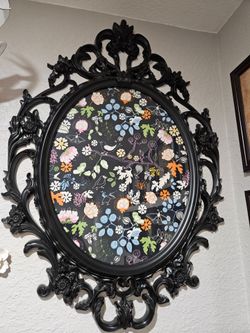 Large oval ornate frame