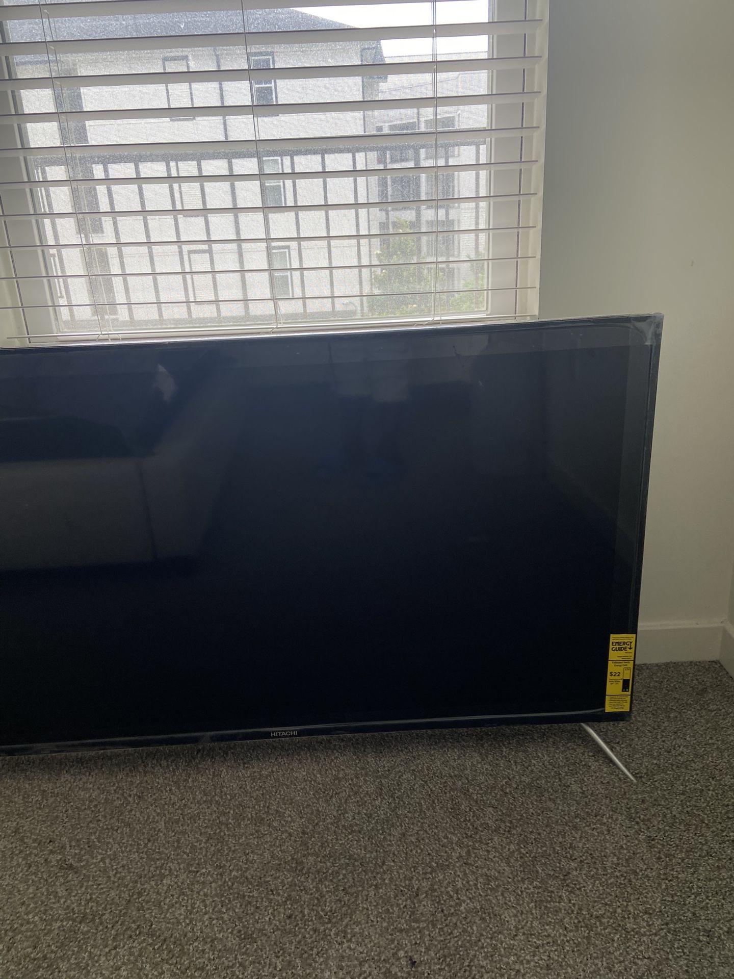 Brand new 55” TV (Plastic On)