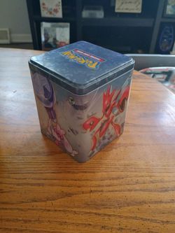 Pokemon tin with Pokemon balls
