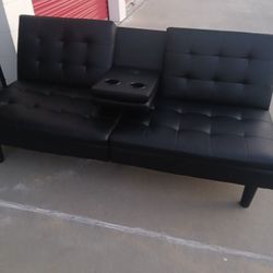 Couch/bed With USB And Cener Cup Holders And Arm Reas