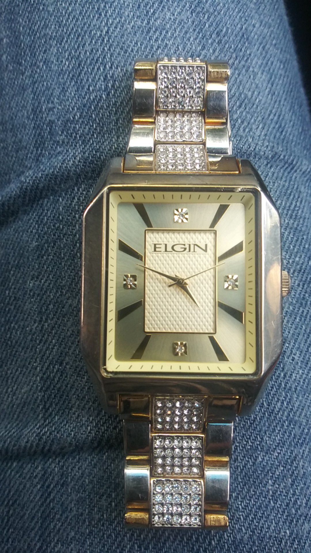 Mens Elgin watch water resistant (not gold plated and 120 quarts crystals but im pretty sure face and inside is gold and diamond chip)