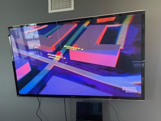 65” Panasonic TV with FIRESTICK, mount, and remote