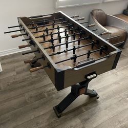 Foosball Table, Complete with 3 balls, in Excellent Used Condition.  Price is Firm.