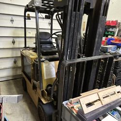 FORKLIFT With Extension Forks OBO Has New Batteries And Seat  With Charger And Breaker 