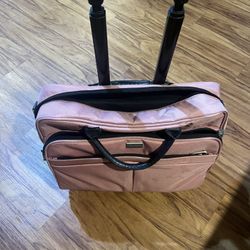 pink soft-sided rolling tote bag or carry-on,